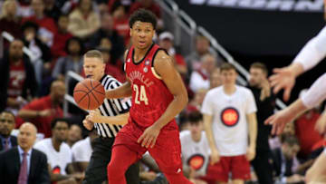 LOUISVILLE, KENTUCKY - FEBRUARY 23: Dwayne Sutton #24 of the Louisville Cardinals brings the ball up the court in the game against the Virginia Cavaliers during the first half at KFC YUM! Center on February 23, 2019 in Louisville, Kentucky. (Photo by Justin Casterline/Getty Images)