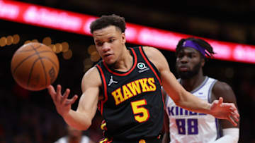 ATLANTA, GEORGIA - JANUARY 26: Kevin Knox II #5 of the Atlanta Hawks loses a rebound out of bounds against the Sacramento Kings during the second half at State Farm Arena on January 26, 2022 in Atlanta, Georgia. NOTE TO USER: User expressly acknowledges and agrees that, by downloading and or using this photograph, User is consenting to the terms and conditions of the Getty Images License Agreement. (Photo by Kevin C. Cox/Getty Images)