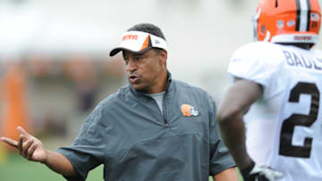 BEREA, OHIO - JULY 29, 2013: Defensive coordinator Ray Horton of the Cleveland Browns talks to defensive back Johnson Bademosi