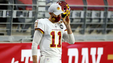 GLENDALE, ARIZONA - DECEMBER 13: Quarterback Alex Smith #11 of the Washington Football Team looks on from the sidelines during the game against the San Francisco 49ers at State Farm Stadium on December 13, 2020 in Glendale, Arizona. (Photo by Christian Petersen/Getty Images)