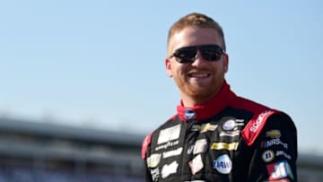 CHARLOTTE, NC - MAY 17: Chris Buescher, driver of the #37 Kroger Your Personal Pit Stop Chevrolet, walks on the grid during qualifying for the Monster Energy NASCAR Cup Series Open Race at Charlotte Motor Speedway on May 17, 2019 in Charlotte, North Carolina. (Photo by Jared C. Tilton/Getty Images)