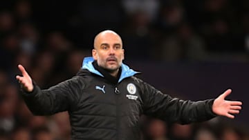 Pep Guardiola, Manager of Manchester City reacts during the Premier League match between Tottenham Hotspur and Manchester City (Photo by Catherine Ivill/Getty Images)