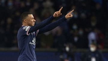 Kylian Mbappe celebrates after scoring their side's first goal during the UEFA Champions League Round of 16 match between Paris Saint-Germain and Real Madrid at Parc des Princes on February 15, 2022 in Paris, France. (Photo by Tnani Badreddine/Quality Sport Images/Getty Images)
