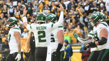 Oct 2, 2022; Pittsburgh, Pennsylvania, USA; New York Jets quarterback Zach Wilson (2) celebrates a game-winning touchdown against the Pittsburgh Steelers during the fourth quarter at Acrisure Stadium. The Jets won 24-20. Mandatory Credit: Philip G. Pavely-USA TODAY Sports