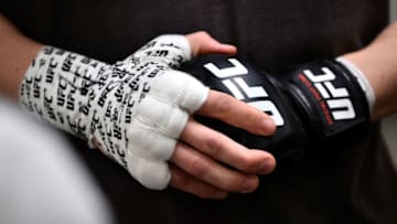 LAS VEGAS, NEVADA - MARCH 02: Edmen Shahbazyan puts on his gloves backstage during the UFC 235 event at T-Mobile Arena on March 2, 2019 in Las Vegas, Nevada. (Photo by Chris Unger/Zuffa LLC/Zuffa LLC via Getty Images)