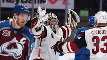 Mar 8, 2021; Denver, Colorado, USA; Arizona Coyotes goaltender Antti Raanta (32) celebrates defeating the Colorado Avalanche at Ball Arena. Mandatory Credit: Ron Chenoy-USA TODAY Sports