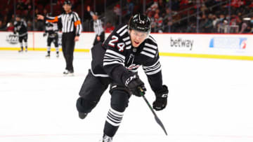 New Jersey Devils defenseman Ty Smith #24 (Photo by Rich Graessle/Getty Images)