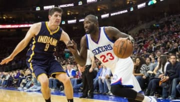 Feb 20, 2015; Philadelphia, PA, USA; Philadelphia 76ers guard Jason Richardson (23) drives past Indiana Pacers forward Damjan Rudez (9) during the second half at Wells Fargo Center. The Pacers defeated the 76ers 106-95. Mandatory Credit: Bill Streicher-USA TODAY Sports