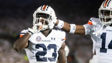 Auburn football's Roger McCreary (23) motions to Penn State fans after making an interception late in the second quarter against Penn State at Beaver Stadium on Saturday, Sept. 18, 2021, in State College.