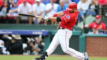 Oct 7, 2016; Arlington, TX, USA; Texas Rangers first baseman Mitch Moreland (18) doubles against the Toronto Blue Jays during the eighth inning of game two of the 2016 ALDS playoff baseball series at Globe Life Park in Arlington. Mandatory Credit: Kevin Jairaj-USA TODAY Sports