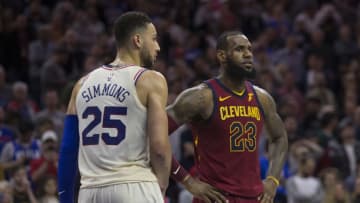 PHILADELPHIA, PA - APRIL 6: Ben Simmons #25 of the Philadelphia 76ers and LeBron James #23 of the Cleveland Cavaliers look on during foul shots at the Wells Fargo Center on April 6, 2018 in Philadelphia, Pennsylvania. NOTE TO USER: User expressly acknowledges and agrees that, by downloading and or using this photograph, User is consenting to the terms and conditions of the Getty Images License Agreement. (Photo by Mitchell Leff/Getty Images) *** Local Caption *** Ben Simmons;LeBron James