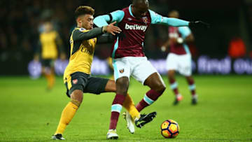 LONDON, ENGLAND - DECEMBER 03: Angelo Ogbonna of West Ham battles for the ball with Alex Oxlade-Chamberlain of Arsenal during the Premier League match between West Ham United and Arsenal at London Stadium on December 3, 2016 in London, England. (Photo by Jordan Mansfield/Getty Images)