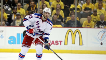 Apr 13, 2016; Pittsburgh, PA, USA; New York Rangers defenseman Keith Yandle (93) moves the puck against the Pittsburgh Penguins during the third period in game one of the first round of the 2016 Stanley Cup Playoffs at the CONSOL Energy Center. The Penguins won 5-2. Mandatory Credit: Charles LeClaire-USA TODAY Sports