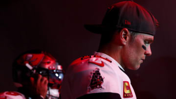 TAMPA, FL - JANUARY 16: Tom Brady #12 of the Tampa Bay Buccaneers walks through the tunnel prior to an NFL wild card playoff football game against the Dallas Cowboys at Raymond James Stadium on January 16, 2023 in Tampa, Florida. (Photo by Kevin Sabitus/Getty Images)
