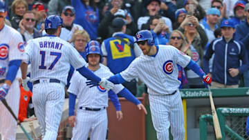 May 7, 2016; Chicago, IL, USA; Chicago Cubs third baseman Kris Bryant (17) is congratulated for hitting a home run by second baseman Ben Zobrist (18) during the fourth inning against the Washington Nationals at Wrigley Field. Mandatory Credit: Dennis Wierzbicki-USA TODAY Sports