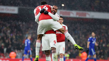 LONDON, ENGLAND - JANUARY 29: Pierre-Emerick Aubameyang of Arsenal celebrates after scoring his team's first goal with Alexandre Lacazette of Arsenal during the Premier League match between Arsenal and Cardiff City at Emirates Stadium on January 29, 2019 in London, United Kingdom. (Photo by Catherine Ivill/Getty Images)