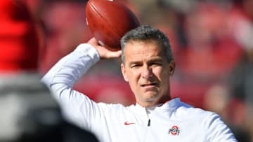 COLUMBUS, OH - NOVEMBER 3: Head Coach Urban Meyer of the Ohio State Buckeyes throws a football while his team warms up before a game against the Nebraska Cornhuskers at Ohio Stadium on November 3, 2018 in Columbus, Ohio. (Photo by Jamie Sabau/Getty Images)