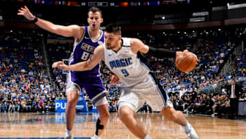 ORLANDO, FL - OCTOBER 30: Nikola Vucevic #9 of the Orlando Magic handles the ball against the Sacramento Kings on October 30, 2018 at Amway Center in Orlando, Florida. NOTE TO USER: User expressly acknowledges and agrees that, by downloading and/or using this Photograph, user is consenting to the terms and conditions of the Getty Images License Agreement. Mandatory Copyright Notice: Copyright 2018 NBAE (Photo by Fernando Medina/NBAE via Getty Images)
