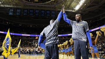 Oct 6, 2016; San Jose, CA, USA; Golden State Warriors forward Kevin Durant (35) greets forward Draymond Green (23) before the start of the game against the Sacramento Kings at the SAP Center. Mandatory Credit: Cary Edmondson-USA TODAY Sports