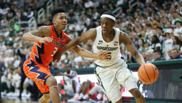 EAST LANSING, MI - FEBRUARY 20: Cassius Winston #5 of the Michigan State Spartans drives to the basket while defended by Te'Jon Lucas #3 of the Illinois Fighting Illini in the first half at the Breslin Center on February 20, 2018 in East Lansing, Michigan. (Photo by Rey Del Rio/Getty Images)