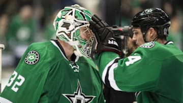 Nov 17, 2016; Dallas, TX, USA; Dallas Stars goalie Kari Lehtonen (32) and left wing Jamie Benn (14) celebrate the win over the Colorado Avalanche at the American Airlines Center. The Stars defeat the Avalanche 3-2. Mandatory Credit: Jerome Miron-USA TODAY Sports