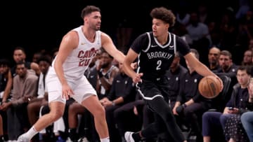 Oct 25, 2023; Brooklyn, New York, USA; Brooklyn Nets forward Cameron Johnson (2) controls the ball against Cleveland Cavaliers forward Georges Niang (20) during the second quarter at Barclays Center. Mandatory Credit: Brad Penner-USA TODAY Sports