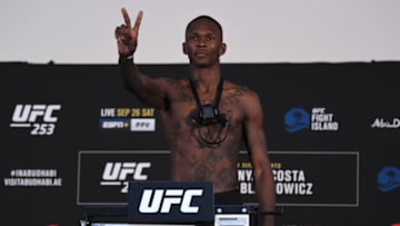 ABU DHABI, UNITED ARAB EMIRATES - SEPTEMBER 25: In this handout image provided by UFC,Israel Adesanya of Nigeria poses on the scale during the UFC 253 weigh-in on September 25, 2020 at Flash Forum on UFC Fight Island, Abu Dhabi, United Arab Emirates. (Photo by Josh Hedges/Zuffa LLC via Getty Images)