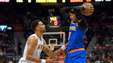 Dec 28, 2016; Atlanta, GA, USA; New York Knicks forward Carmelo Anthony (7) looks to pass while guarded by Atlanta Hawks forward Thabo Sefolosha (25) during the first half at Philips Arena. Mandatory Credit: Dale Zanine-USA TODAY Sports