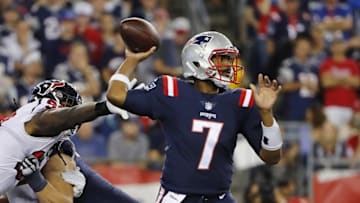 Sep 22, 2016; Foxborough, MA, USA; New England Patriots quarterback Jacoby Brissett (7) throws under pressure from Houston Texans defensive end Jadeveon Clowney (90) during the first half at Gillette Stadium. Mandatory Credit: Winslow Townson-USA TODAY Sports