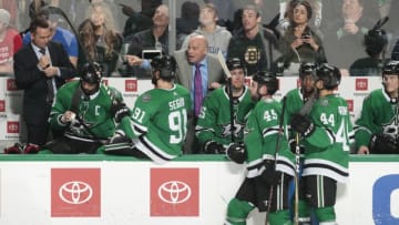 DALLAS, TX - NOVEMBER 16: Jim Montgomery of the Dallas Stars gives instructions to some of his players from the bench against the Boston Bruins at the American Airlines Center on November 16, 2018 in Dallas, Texas. (Photo by Glenn James/NHLI via Getty Images)