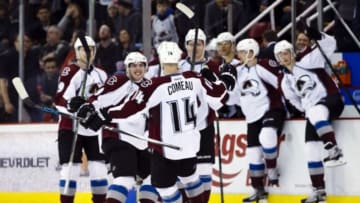 Feb 12, 2016; Detroit, MI, USA; Colorado Avalanche left wing Blake Comeau (14) receives congratulations from teammates after scoring a shoot out goal to win the game against the Detroit Red Wings at Joe Louis Arena. Colorado won 3-2 in an overtime shootout. Mandatory Credit: Rick Osentoski-USA TODAY Sports