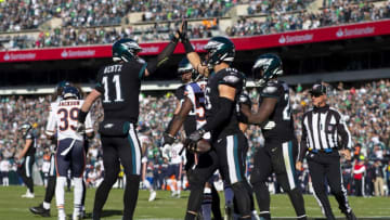 PHILADELPHIA, PA - NOVEMBER 03: Carson Wentz #11 of the Philadelphia Eagles high fives Zach Ertz #86 after Ertz scored a touchdown against the Chicago Bears in the second quarter at Lincoln Financial Field on November 3, 2019 in Philadelphia, Pennsylvania. (Photo by Mitchell Leff/Getty Images)