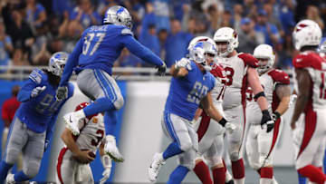 Anthony Zettel #69 of the Detroit Lions celebrate a fourth quarter sack with Armonty Bryant #97 at Ford Field on September 10, 2017 in Detroit, Michigan. Detroit won the game 35-23. (Photo by Gregory Shamus/Getty Images)