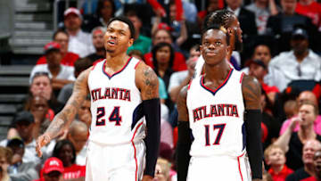 ATLANTA, GA - MAY 03: Dennis Schroder #17 and Kent Bazemore #24 of the Atlanta Hawks react after a foul was called during Game One of the Eastern Conference Semifinals of the 2015 NBA Playoffs against the Washington Wizards at Philips Arena on May 3, 2015 in Atlanta, Georgia. NOTE TO USER: User expressly acknowledges and agrees that, by downloading and/or using this photograph, user is consenting to the terms and conditions of the Getty Images License Agreement. (Photo by Kevin C. Cox/Getty Images)