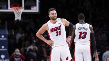 Bam Adebayo #13 and Max Strus #31 of the Miami Heat show emotion as they defeat the Brooklyn Nets at Barclays Center(Photo by Michelle Farsi/Getty Images)