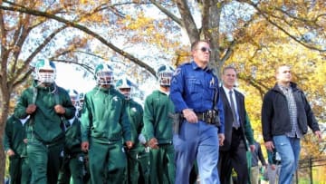 Oct 25, 2014; East Lansing, MI, USA; Michigan State Spartans head coach Mark Dantonio walks with his team before the game against the Michigan Wolverines at Spartan Stadium. Mandatory Credit: Mike Carter-USA TODAY Sports