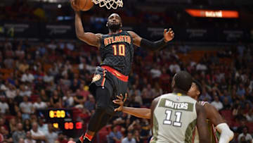 Nov 15, 2016; Miami, FL, USA; Atlanta Hawks guard Tim Hardaway Jr. (10) dunks past Miami Heat guard Dion Waiters (11) during the second half at American Airlines Arena. The Hawks won 93-90. Mandatory Credit: Steve Mitchell-USA TODAY Sports