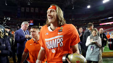 GLENDALE, ARIZONA - DECEMBER 28: Trevor Lawrence #16 of the Clemson Tigers celebrates his teams 29-23 win over the Ohio State Buckeyes in the College Football Playoff Semifinal at the PlayStation Fiesta Bowl at State Farm Stadium on December 28, 2019 in Glendale, Arizona. (Photo by Matthew Stockman/Getty Images)