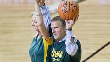 HOUSTON, TX - MAY 24: Houston Rockets Owner Tilman Fertitta and Santa Fe High School Principal Rachel Blundell take part in pre-game ceremonies prior to Game Five of the Western Conference Finals of the 2018 NBA Playoffs between the Houston Rockets and the Golden State Warriors at Toyota Center on May 24, 2018 in Houston, Texas. NOTE TO USER: User expressly acknowledges and agrees that, by downloading and or using this photograph, User is consenting to the terms and conditions of the Getty Images License Agreement. (Photo by Bob Levey/Getty Images)