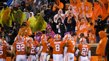 Oct 10, 2020; Clemson, South Carolina, USA; Clemson Tigers fans celebrate after an interception by cornerback Sheridan Jones (26) against the Miami Hurricanes at Memorial Stadium. Mandatory Credit: Ken Ruinard-USA TODAY Sports