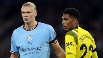 MANCHESTER, ENGLAND - SEPTEMBER 14: Erling Haaland of Manchester City with Jude Bellingham of Borussia Dortmund during the UEFA Champions League group G match between Manchester City and Borussia Dortmund at Etihad Stadium on September 14, 2022 in Manchester, United Kingdom. (Photo by Marc Atkins/Getty Images)
