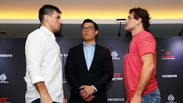 SINGAPORE, SINGAPORE - SEPTEMBER 03: Demian Maia (L) and Ben Askren (R) face off in front of UFC Asia Pacific senior vice president Kevin Chang after a UFC Singapore on-sale press conference at the Mandarin Oriental Hotel on September 03, 2019 in Singapore. (Photo by Yong Teck Lim/Zuffa LLC/Zuffa LLC)