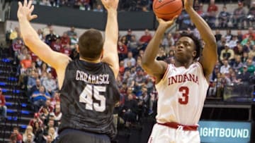 Dec 17, 2016; Indianapolis, IN, USA; Indiana Hoosiers forward OG Anunoby (3) shoots the ball while Butler Bulldogs forward Andrew Chrabascz (45) defends in the first half of the game at Bankers Life Fieldhouse. Mandatory Credit: Trevor Ruszkowski-USA TODAY Sports