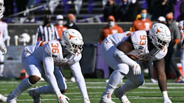 Jacoby Jones, T'Vondre Sweat, Texas Football (Photo by Peter G. Aiken/Getty Images)