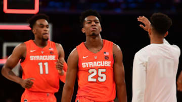 NEW YORK, NEW YORK - NOVEMBER 16: Oshae Brissett #11 and teammate Tyus Battle #25 of the Syracuse Orangereact after the conclusion of the first half of the game against Oregon Ducks during the 2k Empire Classic at Madison Square Garden on November 16, 2018 in New York City. (Photo by Sarah Stier/Getty Images)