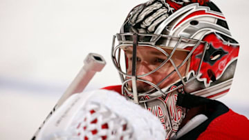 SUNRISE, FL - APRIL 2: Goaltender Cam Ward #30 of the Carolina Hurricanes stretches on the ice during warm ups against the Florida Panthers at the BB&T Center on April 2, 2018 in Sunrise, Florida. (Photo by Eliot J. Schechter/NHLI via Getty Images) *** Local Caption *** Cam Ward
