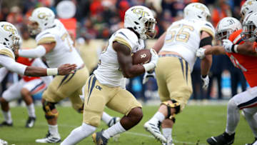 CHARLOTTESVILLE, VA - NOVEMBER 09: Jamious Griffin #22 of the Georgia Tech Yellow Jackets rushes in the first half during a game against the Virginia Cavaliers at Scott Stadium on November 9, 2019 in Charlottesville, Virginia. (Photo by Ryan M. Kelly/Getty Images)
