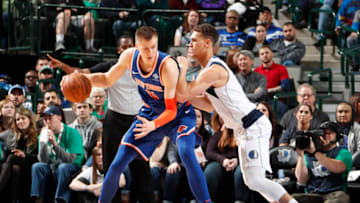 DALLAS, TX - JANUARY 7: Kristaps Porzingis #6 of the New York Knicks jocks for a position during the game against the Dallas Mavericks on January 7, 2018 at the American Airlines Center in Dallas, Texas. Copyright 2018 NBAE (Photo by Danny Bollinger/NBAE via Getty Images)