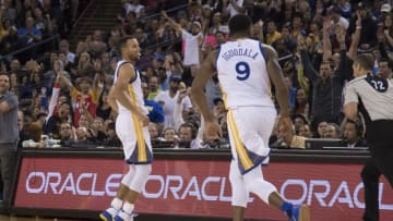 November 7, 2016; Oakland, CA, USA; Golden State Warriors guard Stephen Curry (30, left) celebrates after making a three-point basket against the New Orleans Pelicans during the fourth quarter at Oracle Arena. The Warriors defeated the Pelicans 116-106. Mandatory Credit: Kyle Terada-USA TODAY Sports