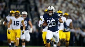 STATE COLLEGE, PA - OCTOBER 21: Saquon Barkley #26 of the Penn State Nittany Lions rushes for a 69 yard touchdown in the first half against the Michigan Wolverines on October 21, 2017 at Beaver Stadium in State College, Pennsylvania. (Photo by Justin K. Aller/Getty Images)